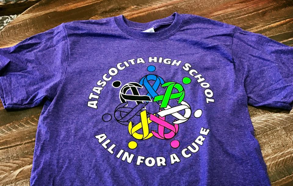 Screen printing done on a t shirt for the Atascocita high school "All in for a cure". 